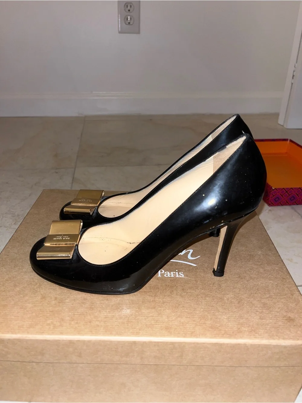 kate spade Black Patent Leather Pumps with Gold Bow Accent